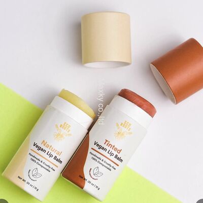 Hollow kraft paper tube/cylindrical box, oval-shaped body lotion and antiperspirant packaging.
