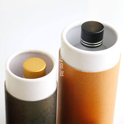 Luxury custom-made paper tubes, suitable for cosmetics and fragrance packaging, made from biodegradable recycled materials.