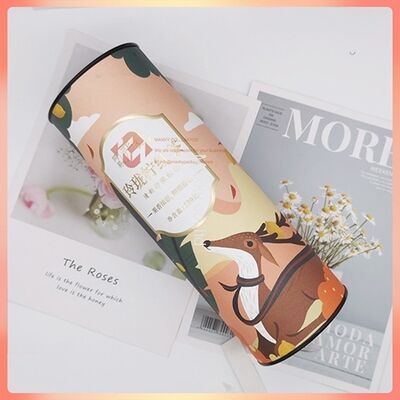 Kraft paper material cylinder packaging with black metal lid