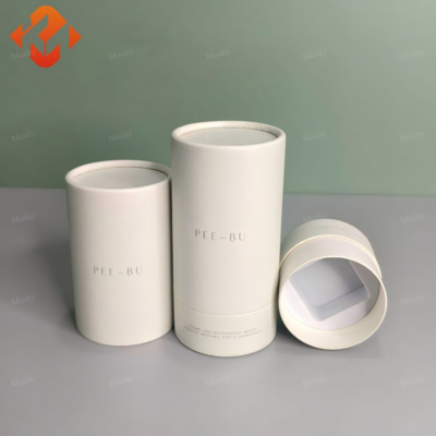 Custom eco-friendly round kraft paper cylinder box for cosmetics and candle packaging, suitable for craft and cosmetic purposes