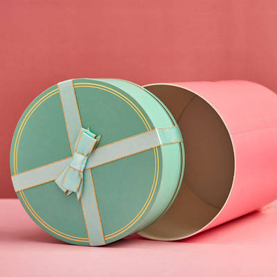 Eco-friendly recycled cylindrical gift boxes, cardboard cylindrical gift boxes, customizable logos.