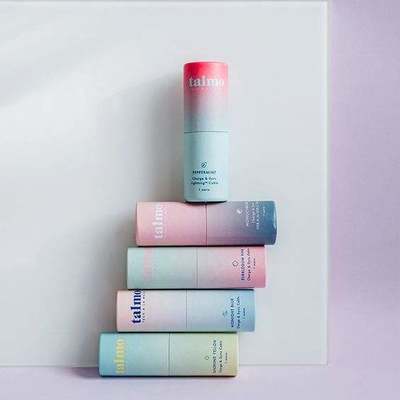 Biodegradable paper tube packaging for cosmetic essential oils, customizable eco-friendly kraft paper tubes with caps.