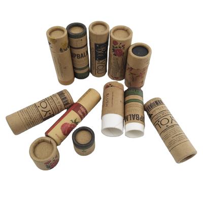 Sliding paper tube packaging, suitable for lipsticks and lip balms, containing waxed paper.