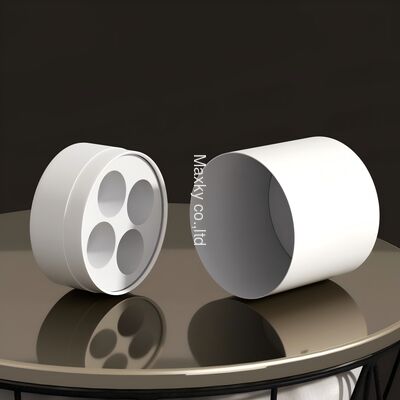 A custom-designed luxury textured leather cylindrical box, an eco-friendly 6ml fragrance packaging set including a paper tube.