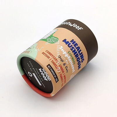 Printed cylindrical aluminum foil cardboard tea canisters, food-grade paper tube packaging, with metal lids.