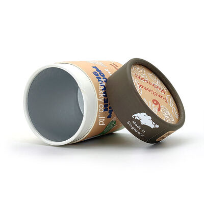 Printed cylindrical aluminum foil cardboard tea canisters, food-grade paper tube packaging, with metal lids.