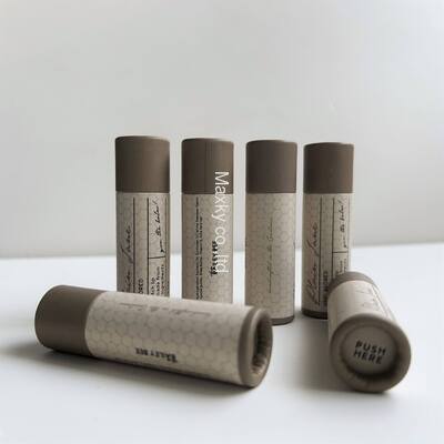 Biodegradable custom cardboard packaging for lipsticks and lip balms in rotating paper tubes