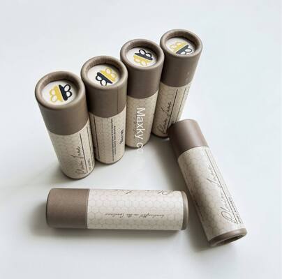 Biodegradable custom cardboard packaging for lipsticks and lip balms in rotating paper tubes