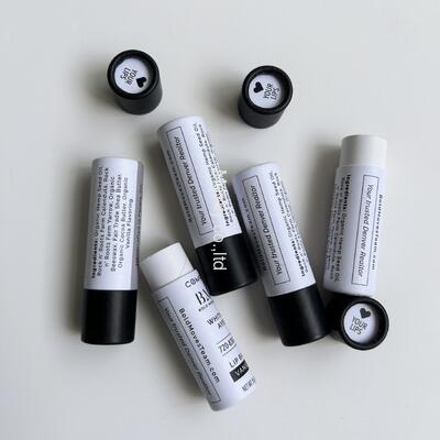 Eco-friendly, custom-designed plastic-free cosmetic kraft paper tubes, suitable for lip balms and face creams.