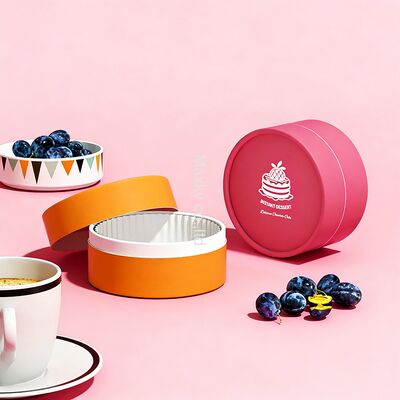 Customized eco-friendly food-grade cardboard cake tube packaging, made with offset paper and UV coating.